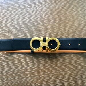 Salvatore Ferragamo Black and Tan Leather Belt with Gold Gancini Buckle